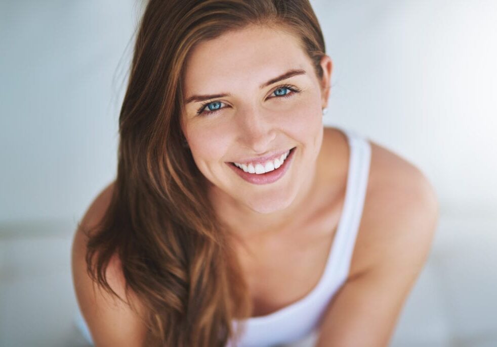 Portrait of a young woman relaxing at home